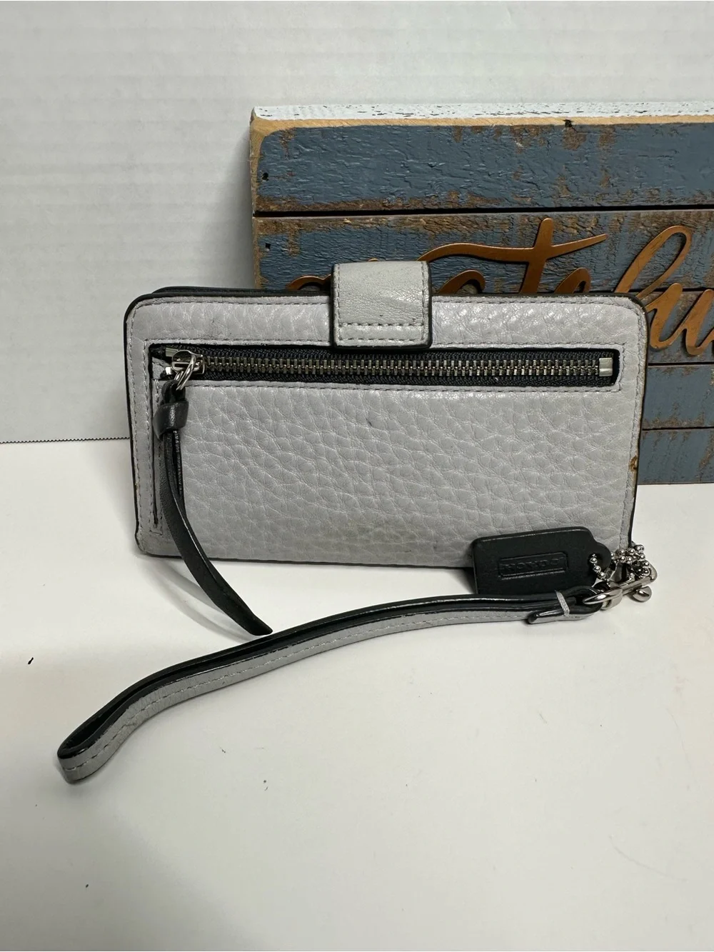 Coach Silver Pebbled Leather Wristlet Case with Strap
